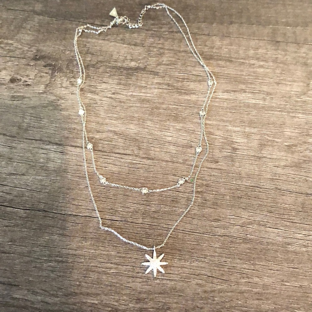 Layered burst pendant necklace with matching earrings